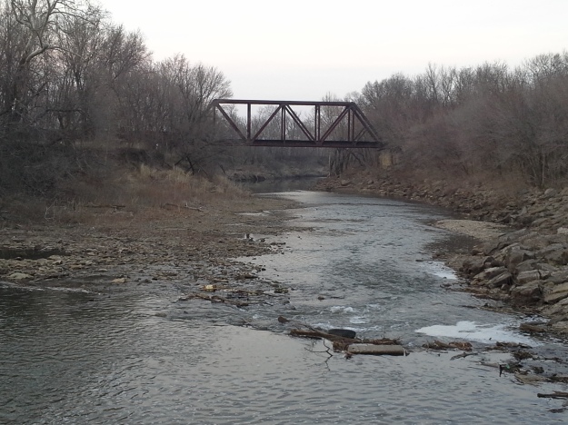 An old railroad bridge crosses the Marais Des Cygnes River west of Ottawa. 